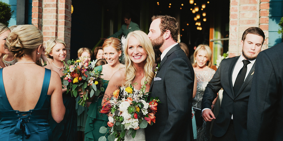 Kristin & Phillip.  Photo by James Moes.  Florals by Paisley Petals